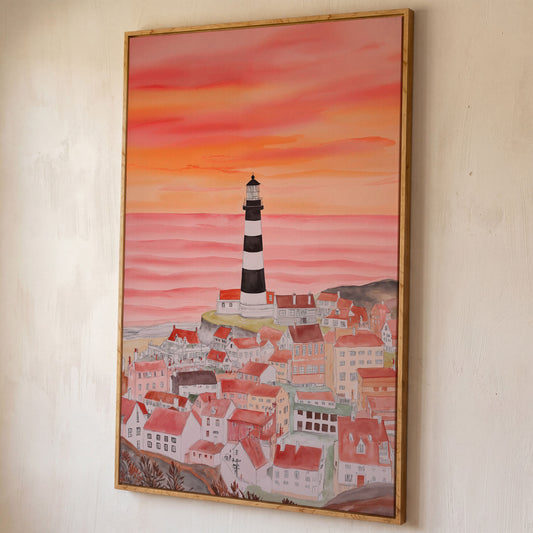 Lighthouse and Seaside Village at Dusk, Coastal Canvas Art shown in white oak floating frame
