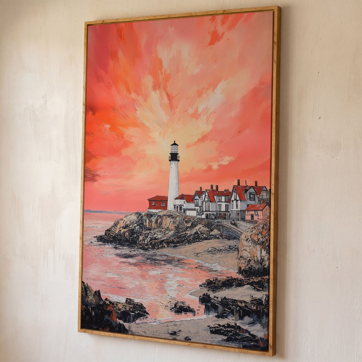Lighthouse at Sunset on Rocky Cliff. Coastal Canvas Art shown in white oak floating frame