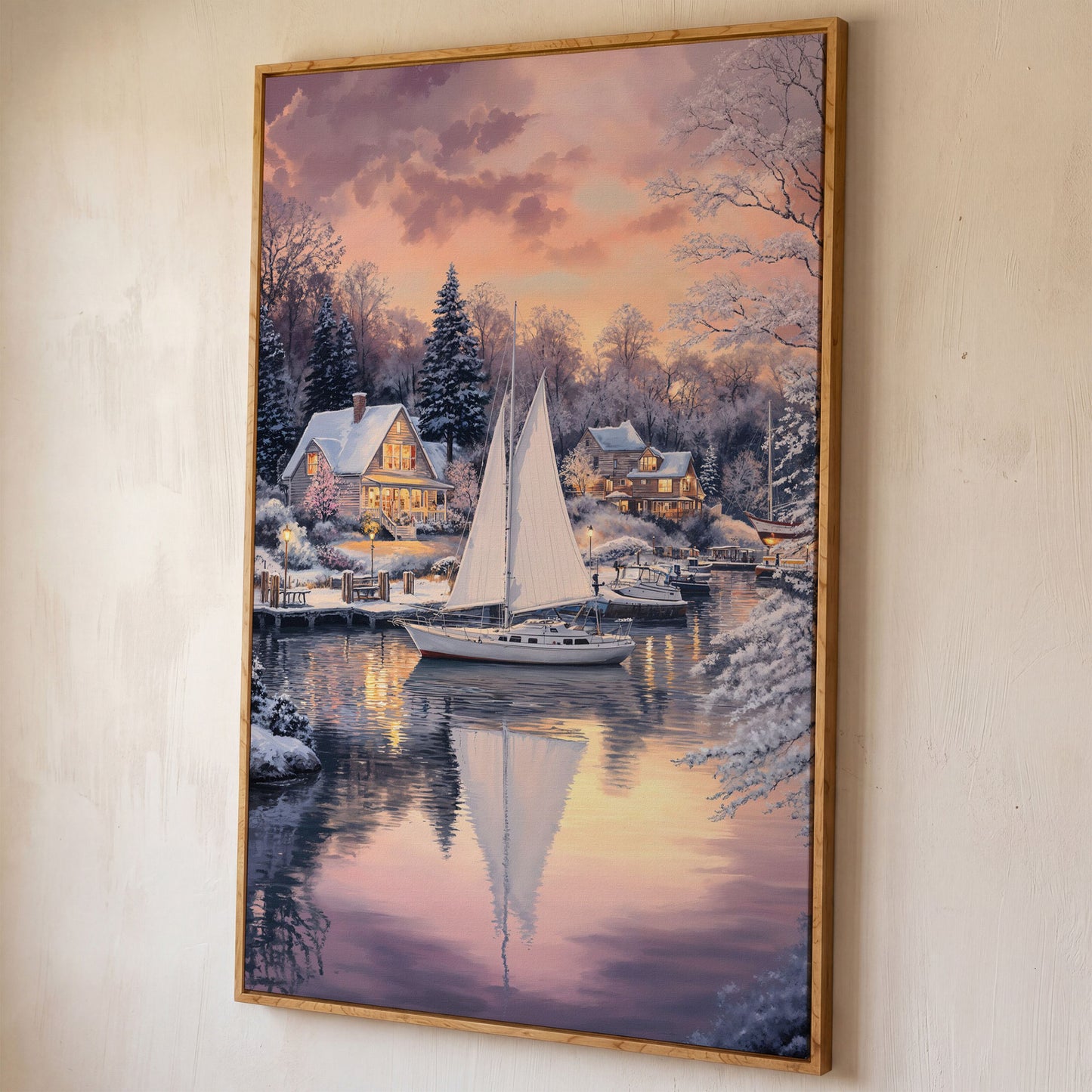 Winter Harbor Sailboat Canvas Art, Snowy Coastal Scene shown in white oak floating frame