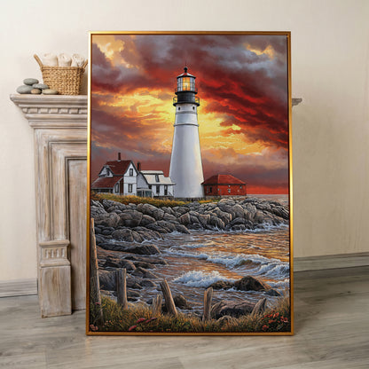 White Lighthouse on Rocky Shore at Sunset. Canvas Wall Art in antique gold floating frame
