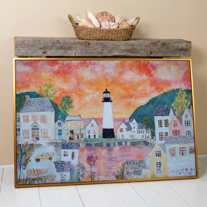 Lighthouse Village at Sunset Canvas Wall Art in antique gold floating frame