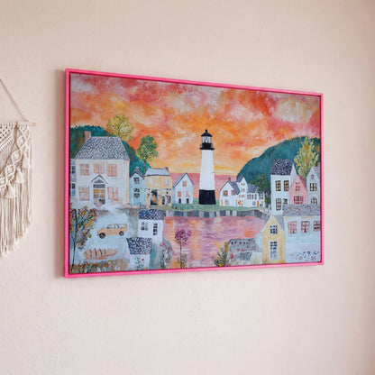 Lighthouse Village at Sunset Canvas Wall Art in pink floating frame