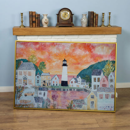 Lighthouse Village at Sunset Canvas Wall Art in yellow gold floating frame