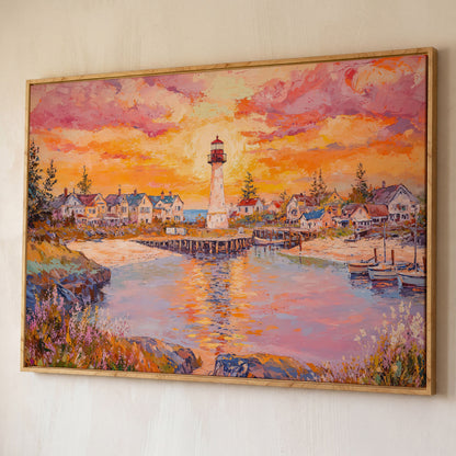 Lighthouse Sunset Canvas Art with Seaside Village and Boats shown in white oak floating frame