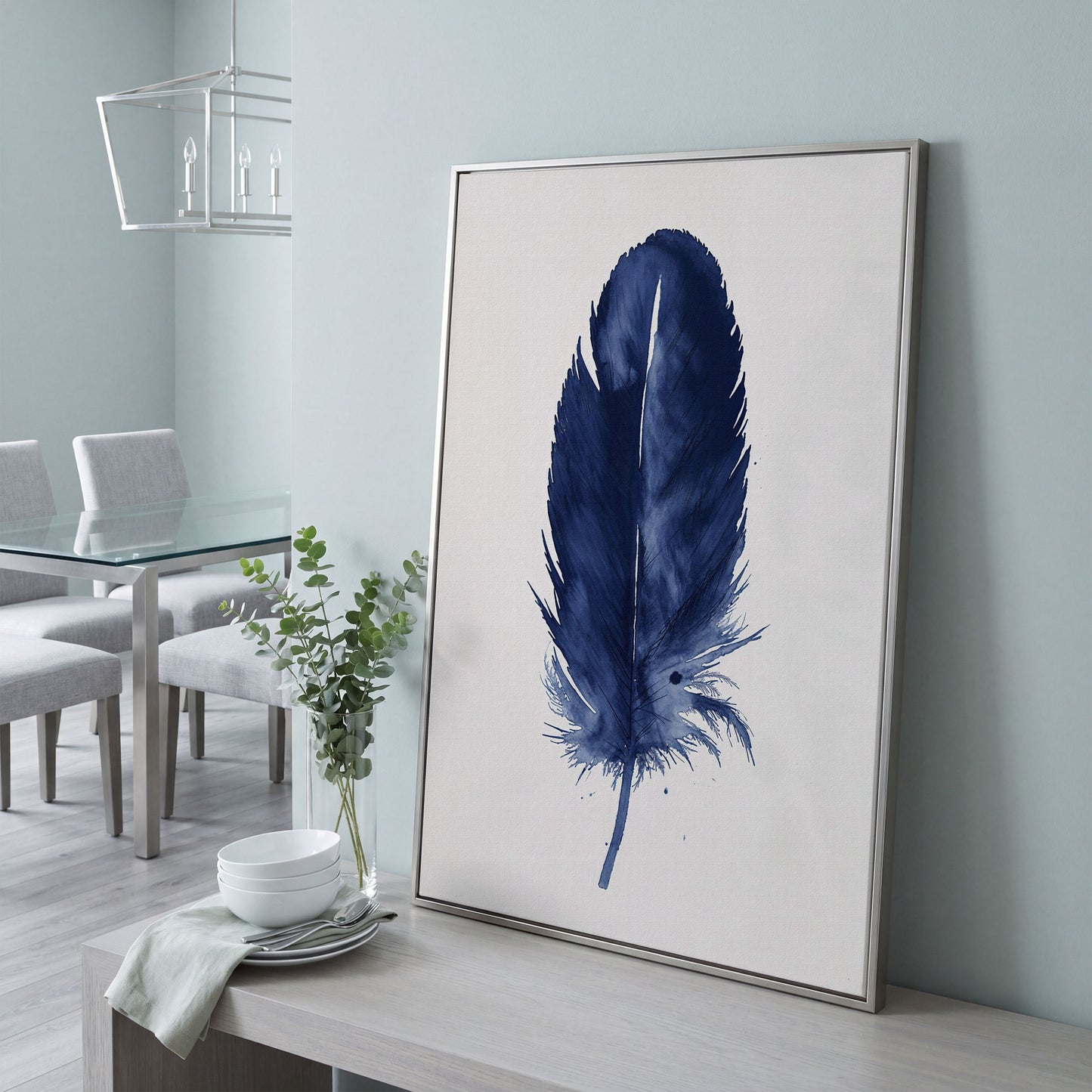 Indigo Feather Watercolor Canvas in silver floating frame