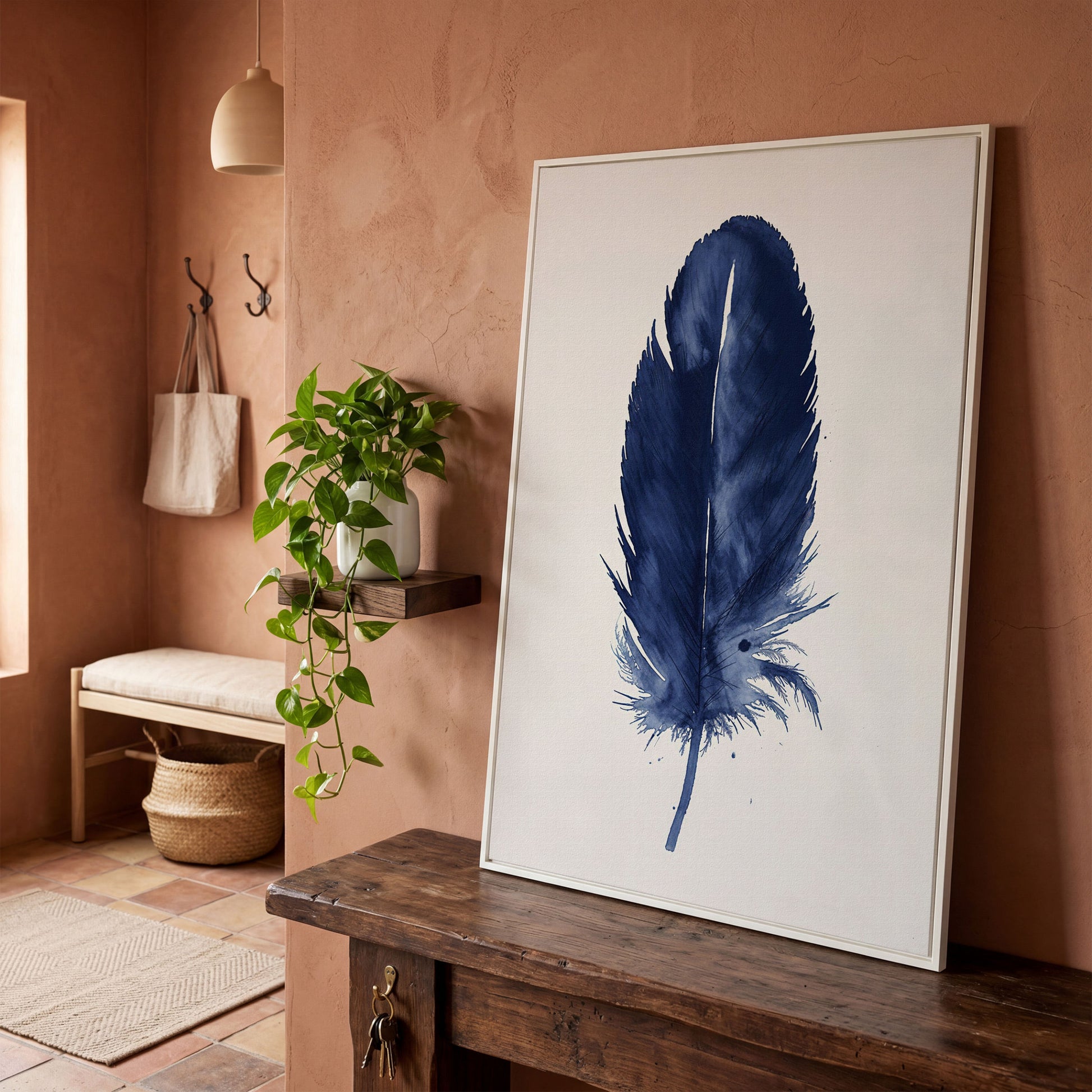 Indigo Feather Watercolor Canvas in white floating frame