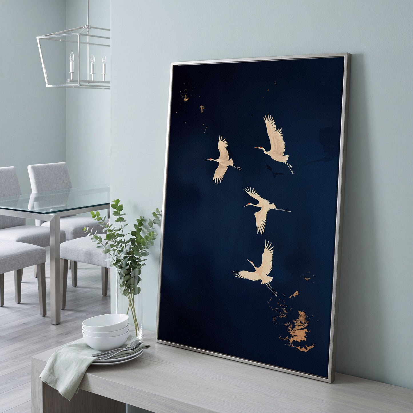 Gold Cranes on Navy Canvas in silver floating frame