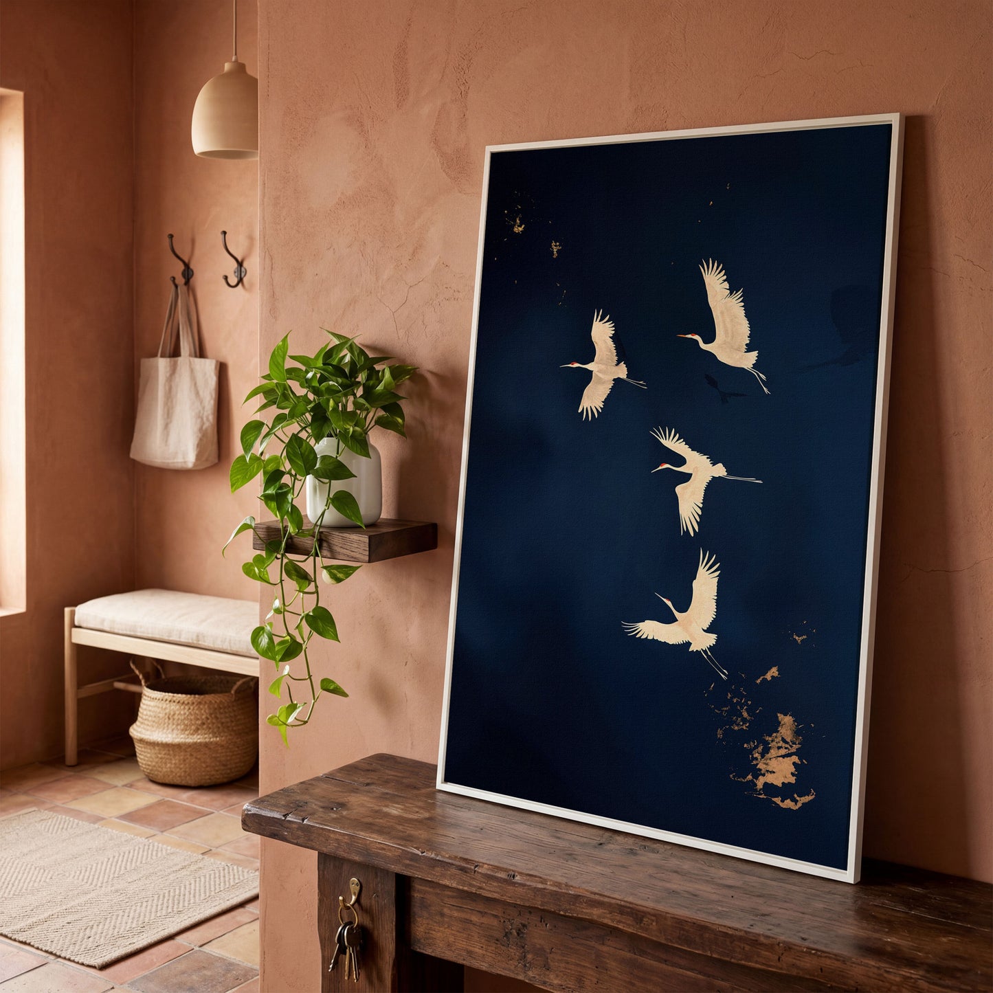 Gold Cranes on Navy Canvas in white floating frame
