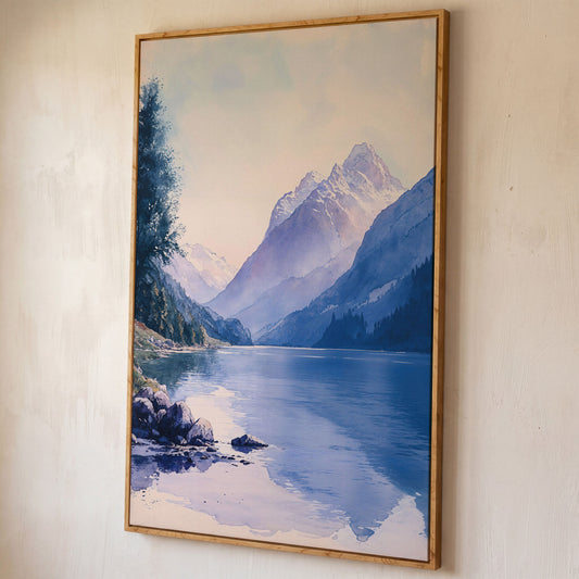 Watercolor Mountain Landscape Canvas in Dusty Blue shown in white oak floating frame
