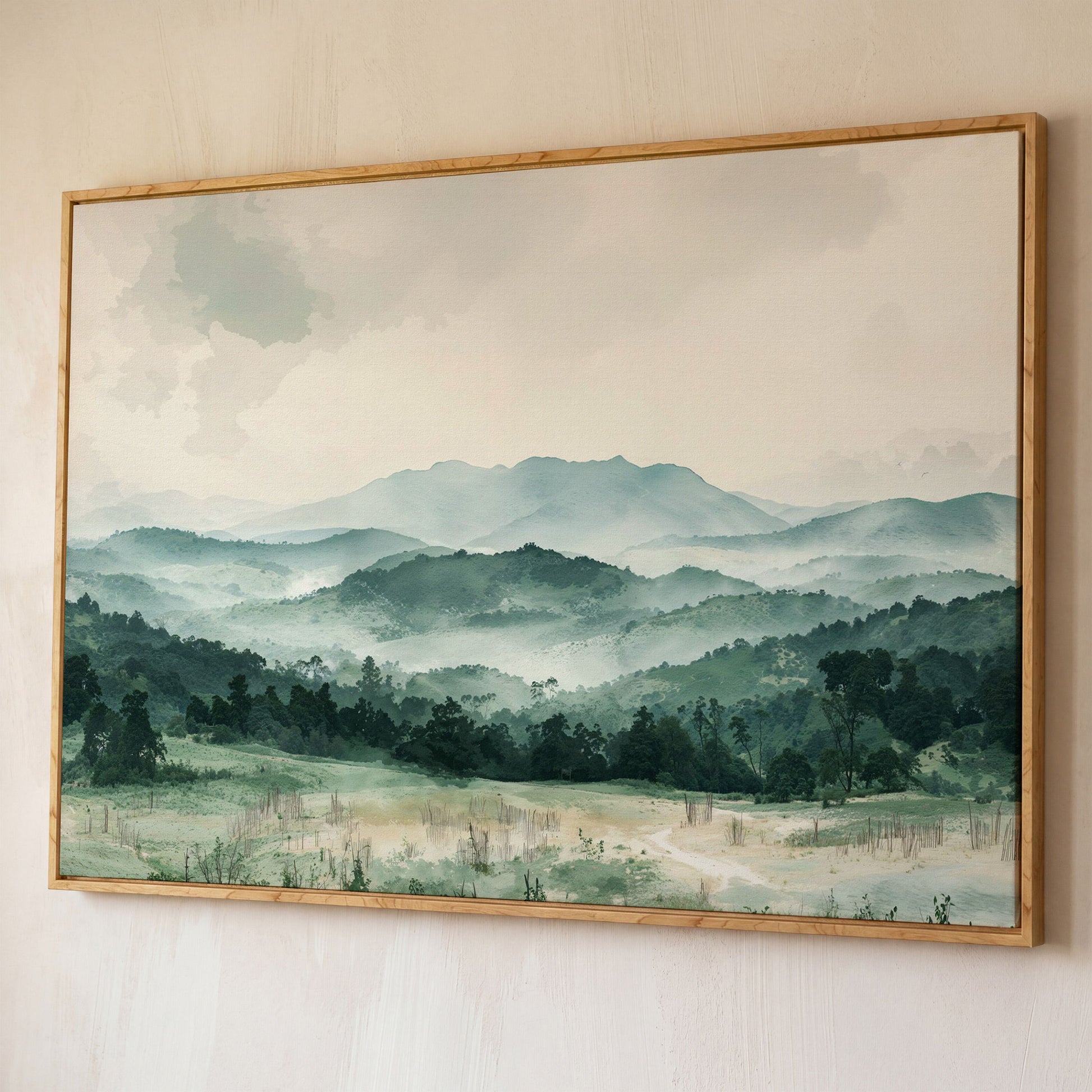 Serene Panoramic Mountainscape Canvas shown in white oak floating frame