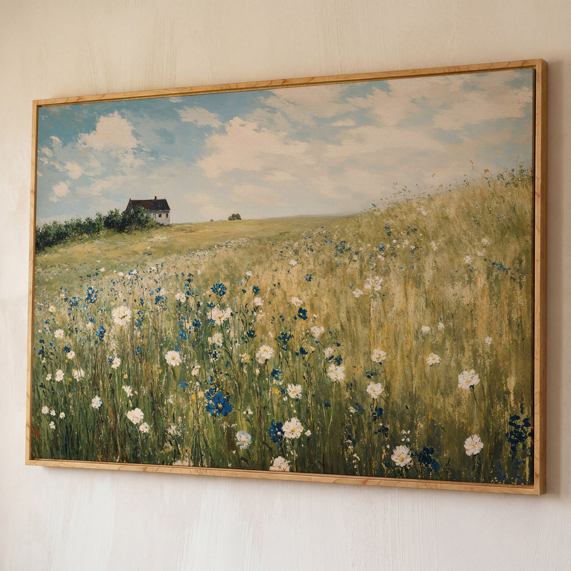 Sky Blue Wildflower Countryside Canvas shown in white oak floating frame