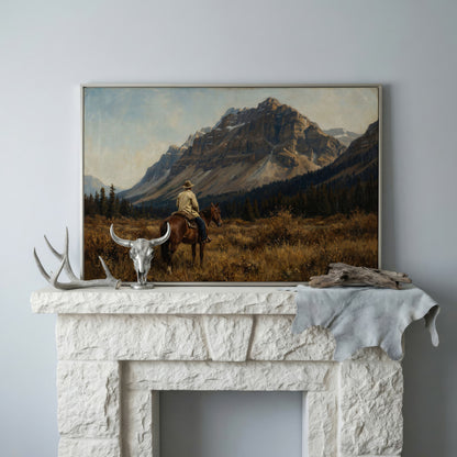 Cowboy on Horseback Facing the Mountains Canvas Wall Art in silver floating frame