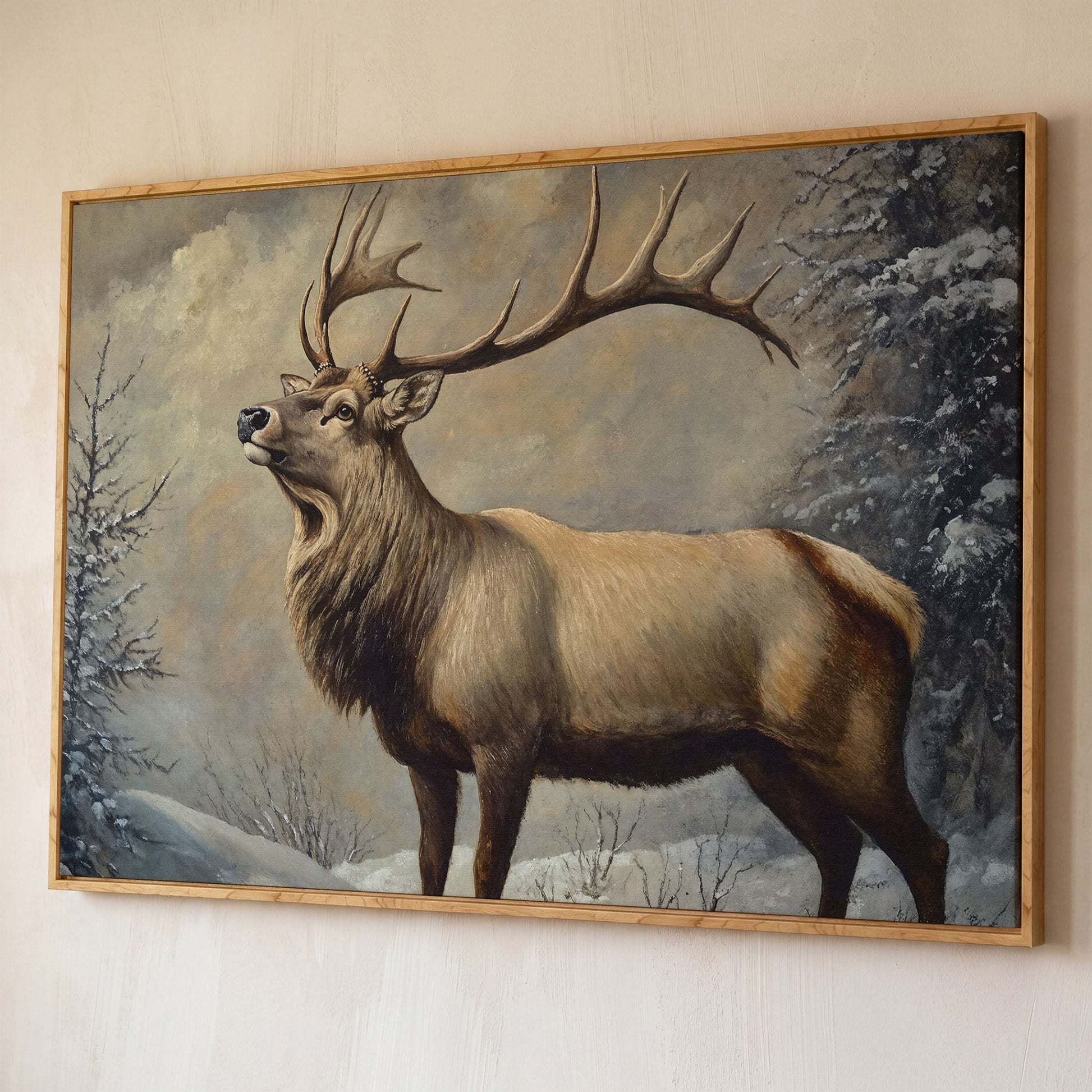 Bull Elk in Snow Canvas Wall Art, Wildlife Print for Cabin Decor shown in white oak floating frame