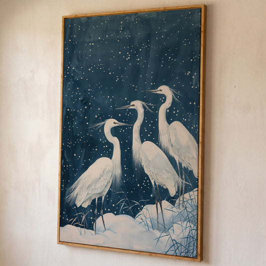 Three White Egrets in a Winter Night Sky Canvas Print shown in white oak floating frame