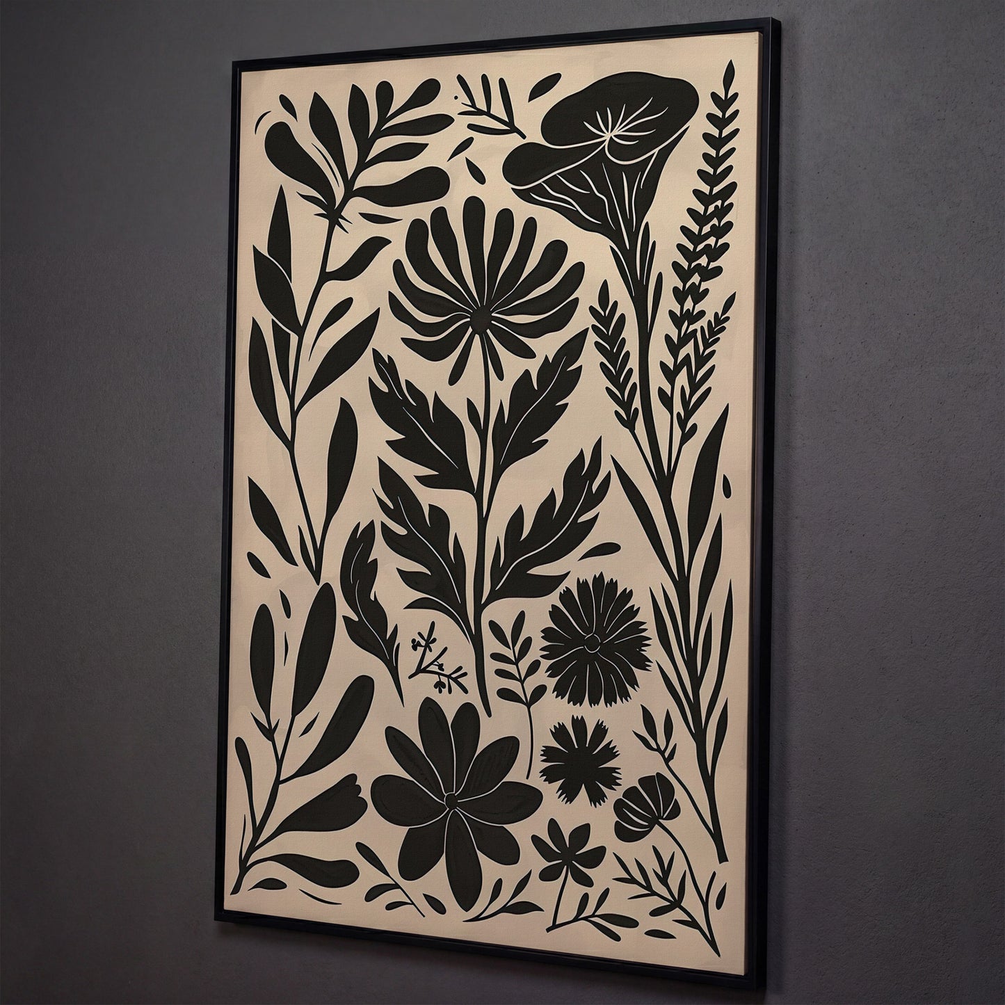 Black and White Botanical Silhouette Canvas Wall Art shown in black floating frame