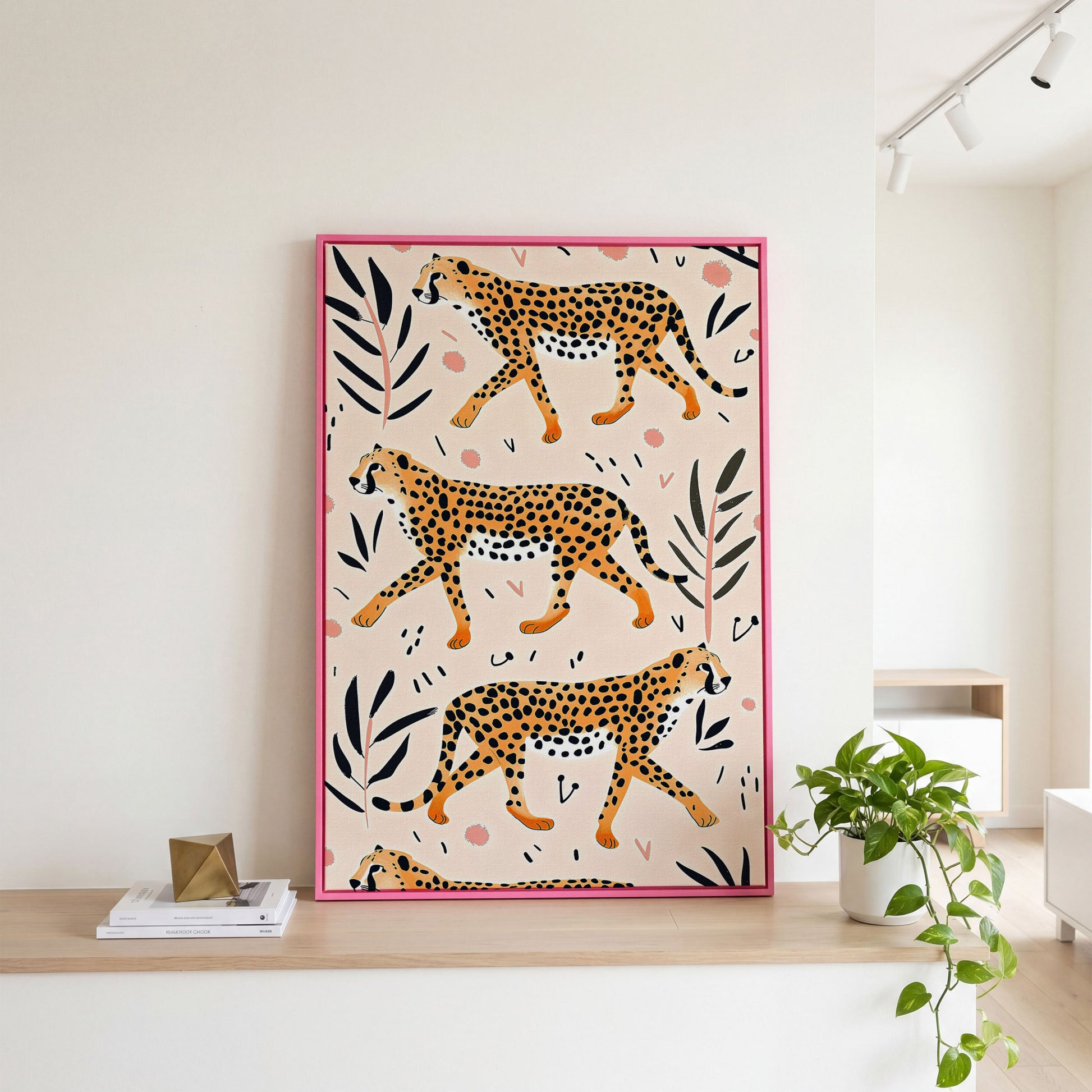 Cheetahs in Motion Canvas Art with Botanical Pattern in pink floating frame