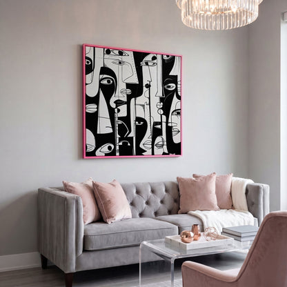 Cubist Abstract Faces in Black and White Canvas in pink floating frame