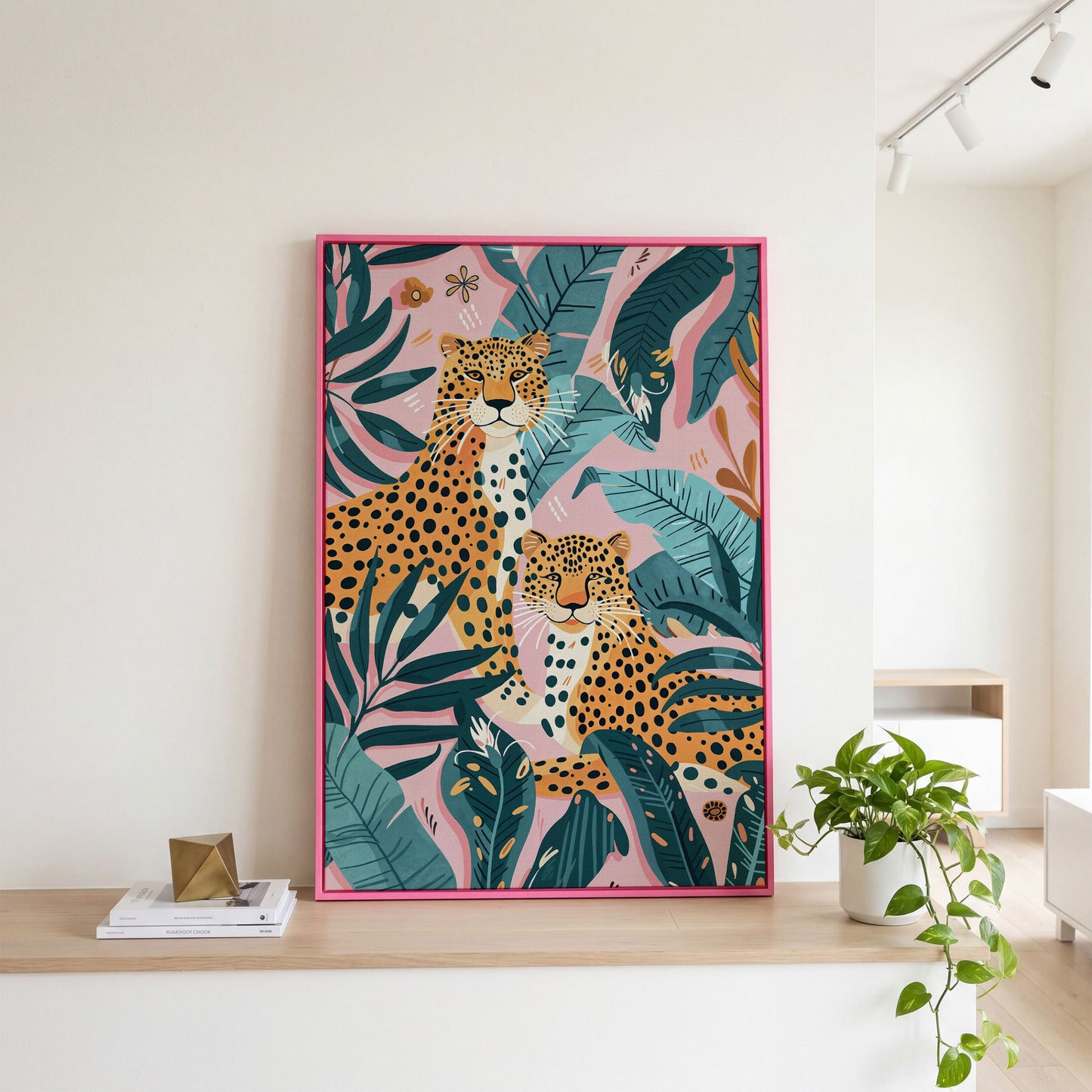 Cheetah Duo in Jungle Leaves Canvas Print in pink floating frame