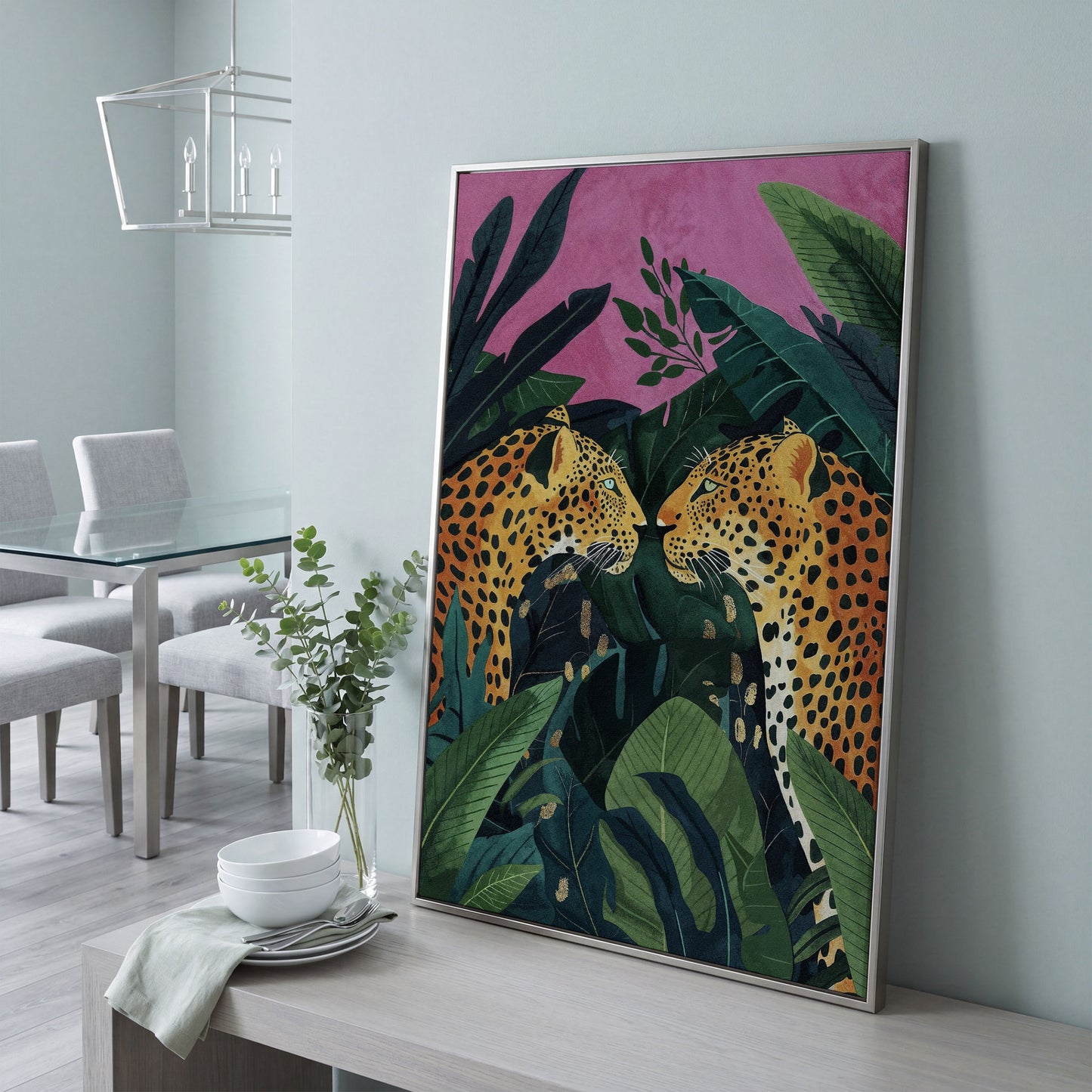Jungle Leopard Pair Canvas Print with Tropical Leaves in silver floating frame