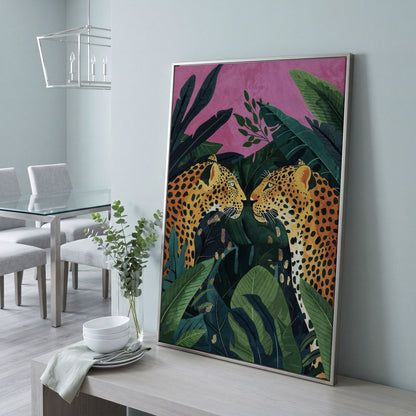 Jungle Leopard Pair Canvas Print with Tropical Leaves in silver floating frame