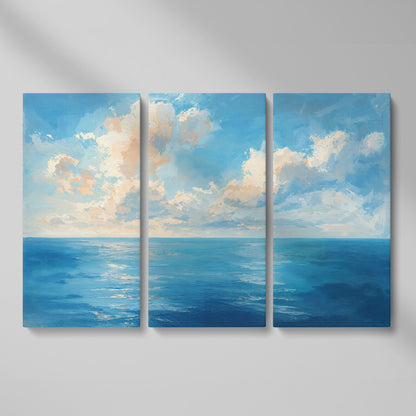 Peaceful Seascape Canvas with Blue Sky and Peach Horizon as 3-panel split version