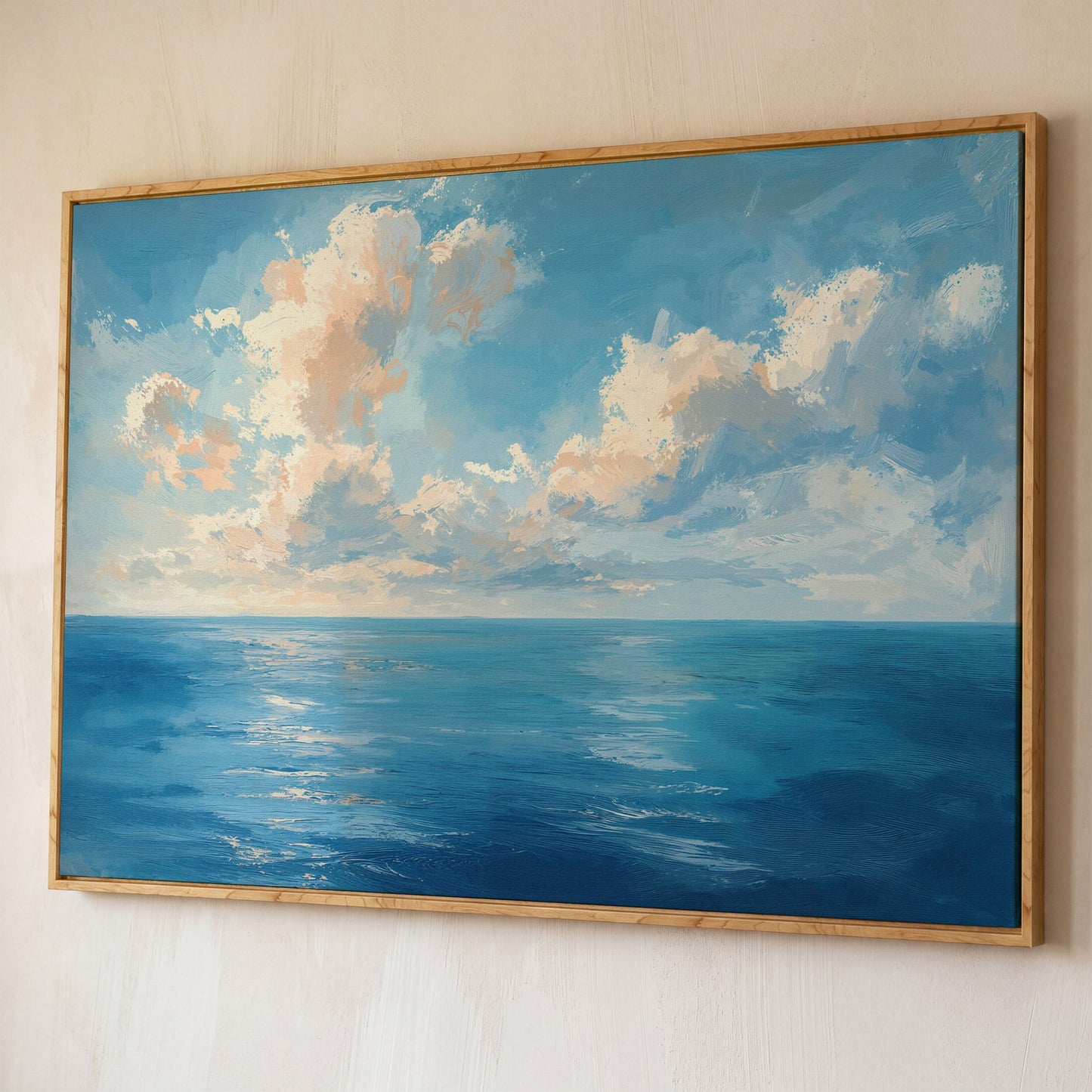 Peaceful Seascape Canvas with Blue Sky and Peach Horizon shown in white oak floating frame