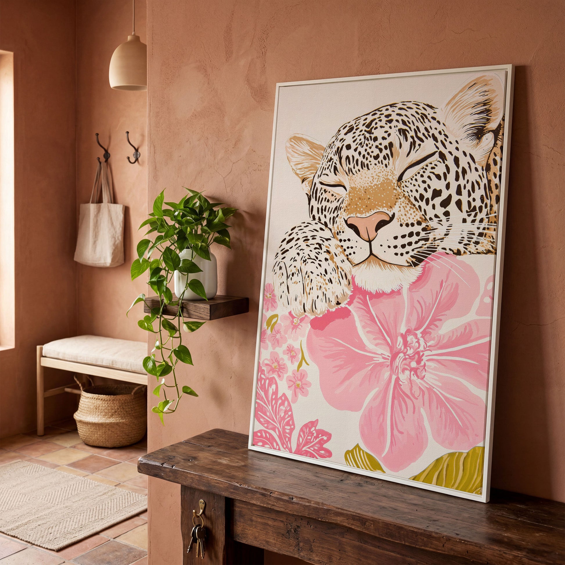Leopard Resting on Pink Flowers Canvas in white floating frame