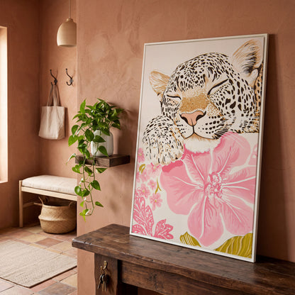 Leopard Resting on Pink Flowers Canvas in white floating frame