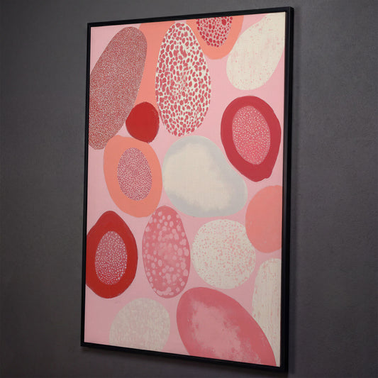 Pink Abstract Pebbles Canvas Print shown in black floating frame