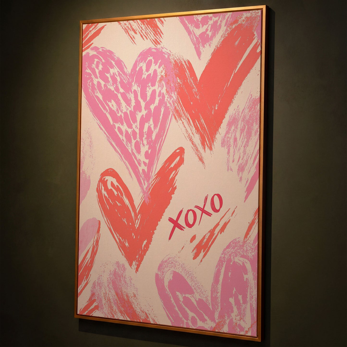 XOXO Pink Heart Canvas Print shown in antique gold floating frame