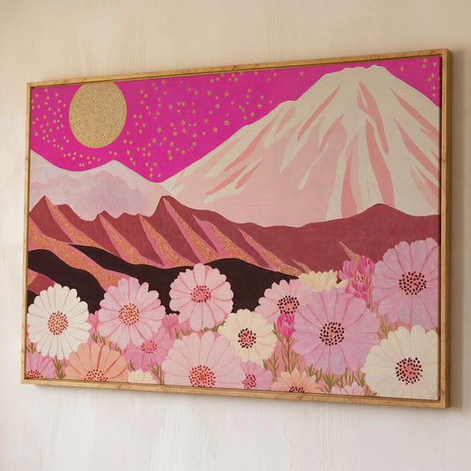 Majestic Mountains and Floral Fields Canvas Print shown in white oak floating frame