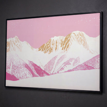 Snowy Mountain Landscape Canvas in Pink and Gold shown in black floating frame