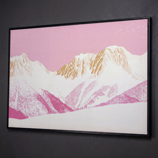 Snowy Mountain Landscape Canvas in Pink and Gold shown in black floating frame
