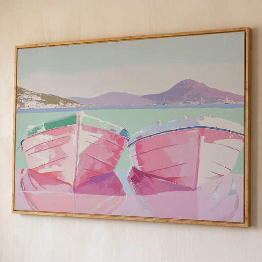 Pink Sailboats on Water Canvas Print shown in white oak floating frame