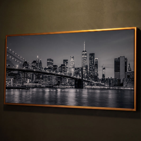 Black & White NYC Skyline Canvas shown in antique gold floating frame
