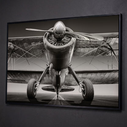 Vintage Airplane on Runway Canvas shown in black floating frame