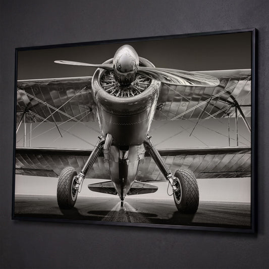 Vintage Airplane on Runway Canvas shown in black floating frame