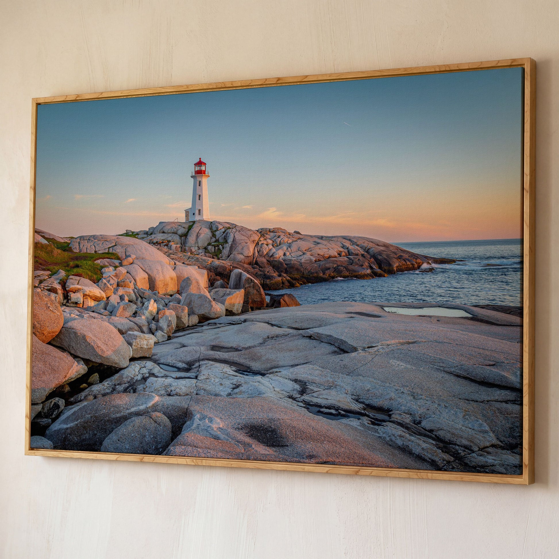 Peggy's Cove Lighthouse Canvas shown in white oak floating frame