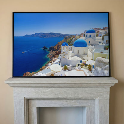 Santorini Island Canvas Print with Blue Domes in black floating frame