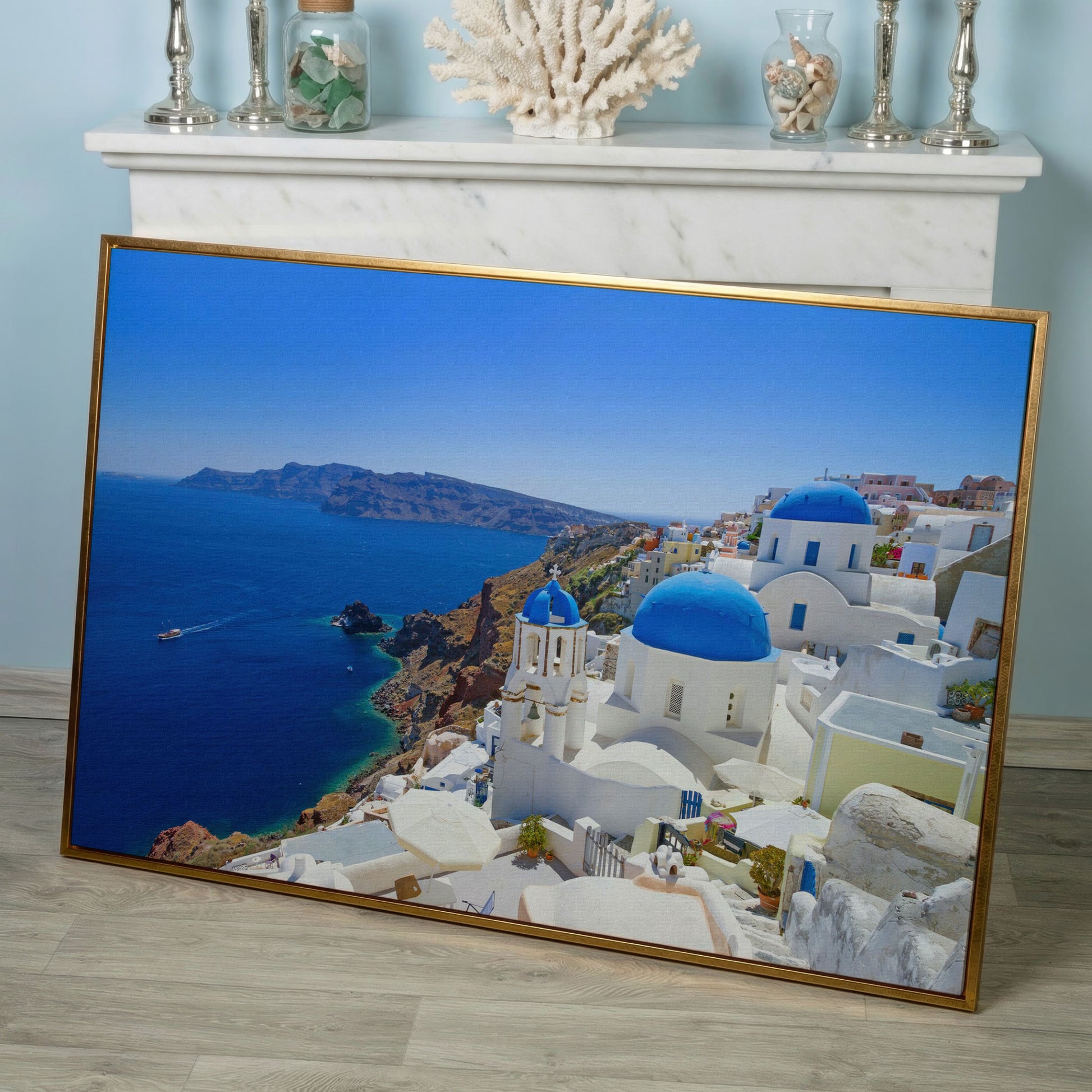 Santorini Island Canvas Print with Blue Domes in rose gold floating frame