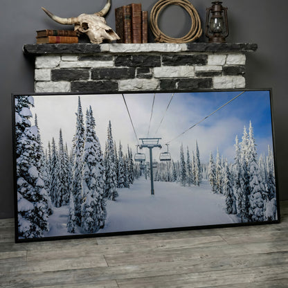 Snowy Ski Lift and Pine Trees Canvas in black floating frame