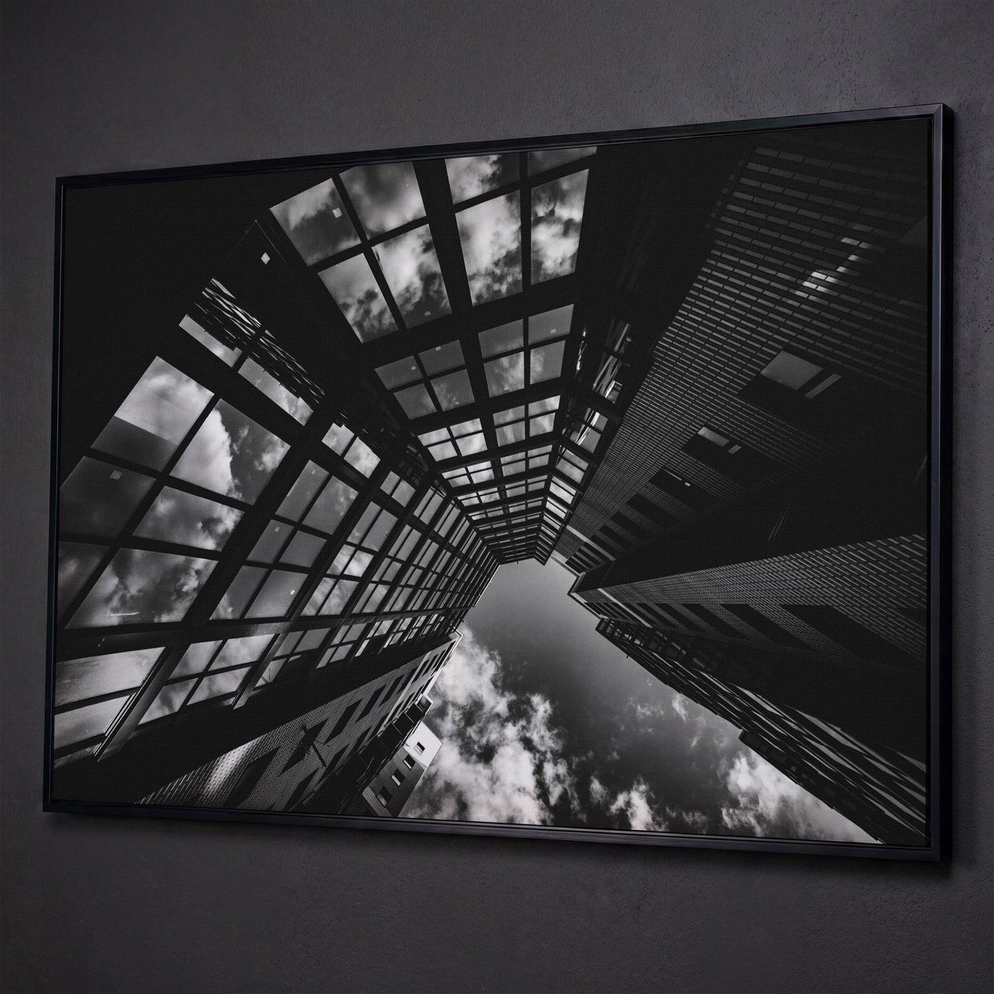 Black and White Multi-Storey Building Canvas shown in black floating frame