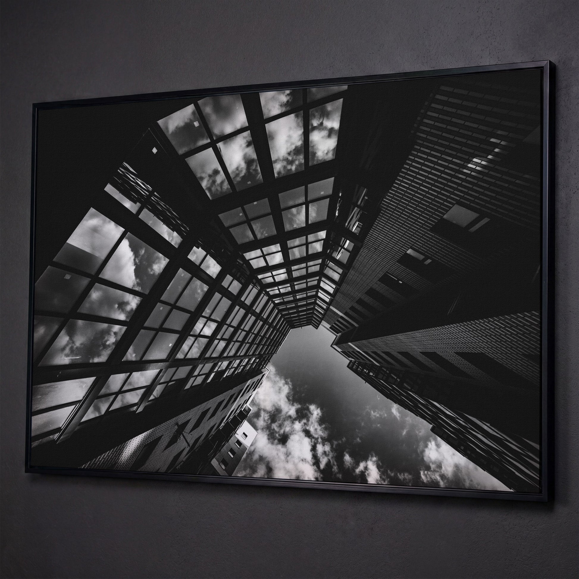 Black and White Multi-Storey Building Canvas shown in black floating frame