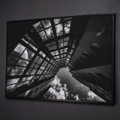 Black and White Multi-Storey Building Canvas shown in black floating frame