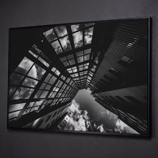 Black and White Multi-Storey Building Canvas shown in black floating frame