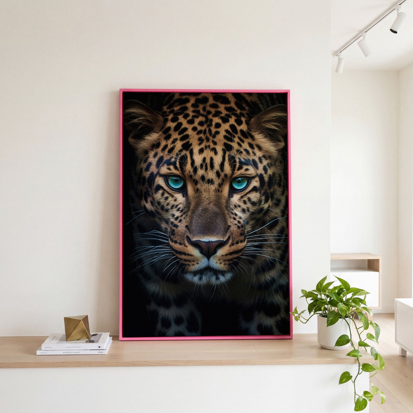 Blue-Eyed Leopard Canvas Print in pink floating frame