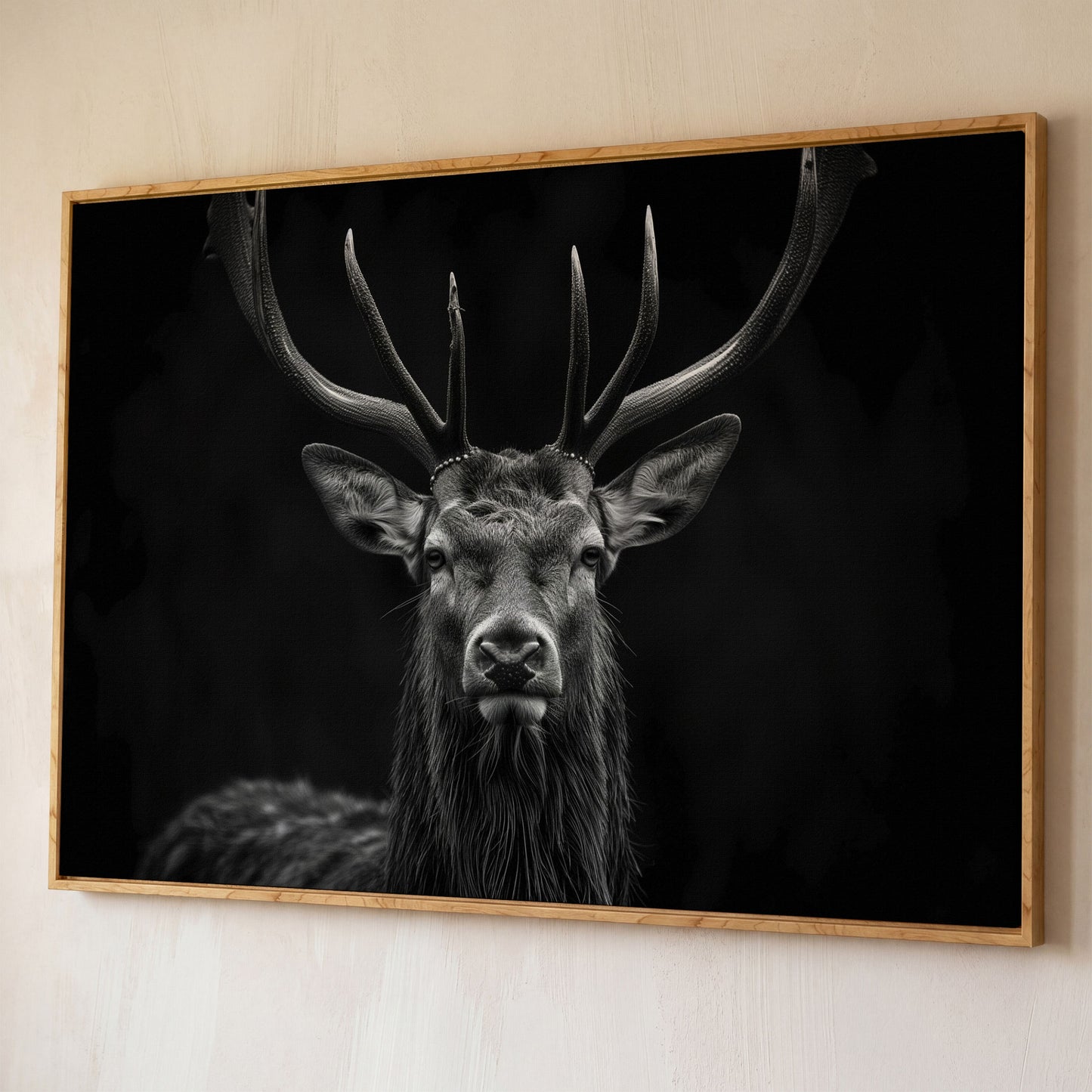 Black & White Stag Portrait Canvas shown in white oak floating frame