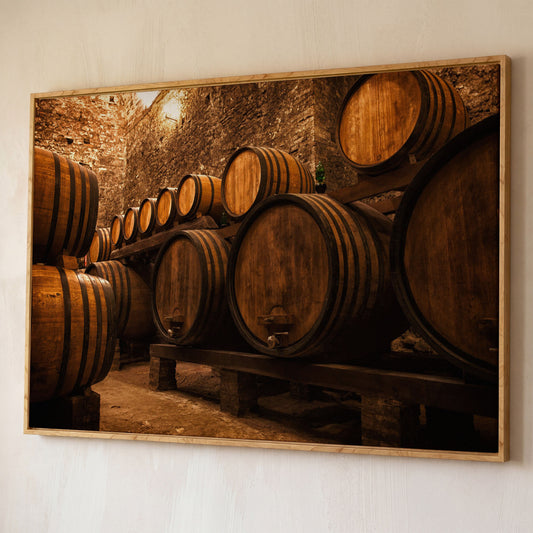 Wine Cellar with Oak Barrels Canvas Art shown in white oak floating frame