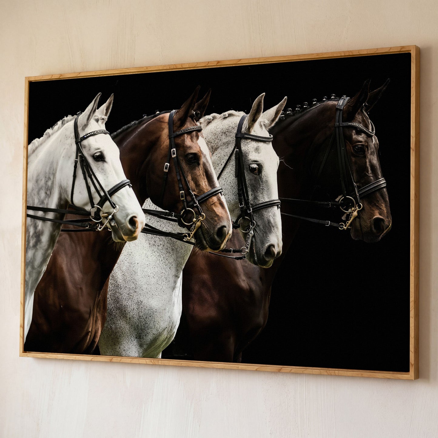 Four Horses in Sepia Canvas Print shown in white oak floating frame