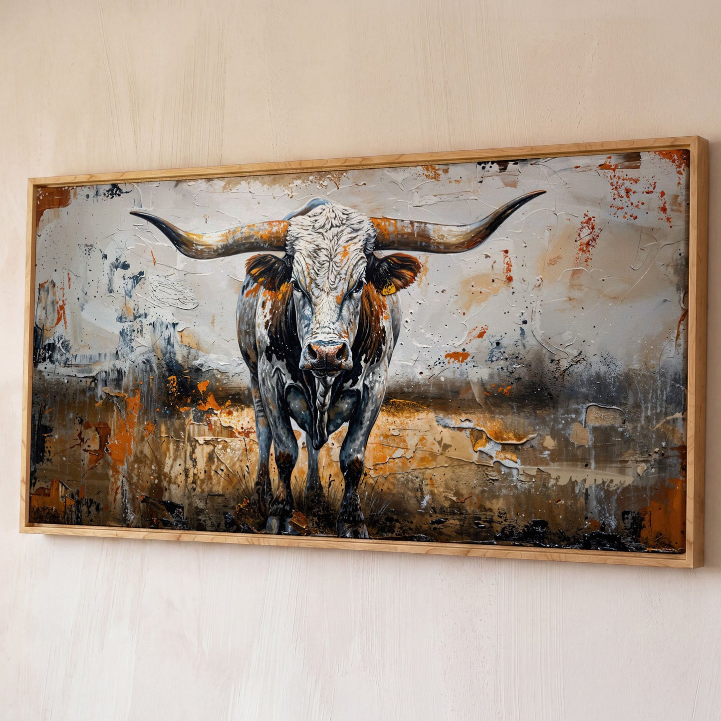 Longhorn Cow Spotted Canvas Print shown in white oak floating frame
